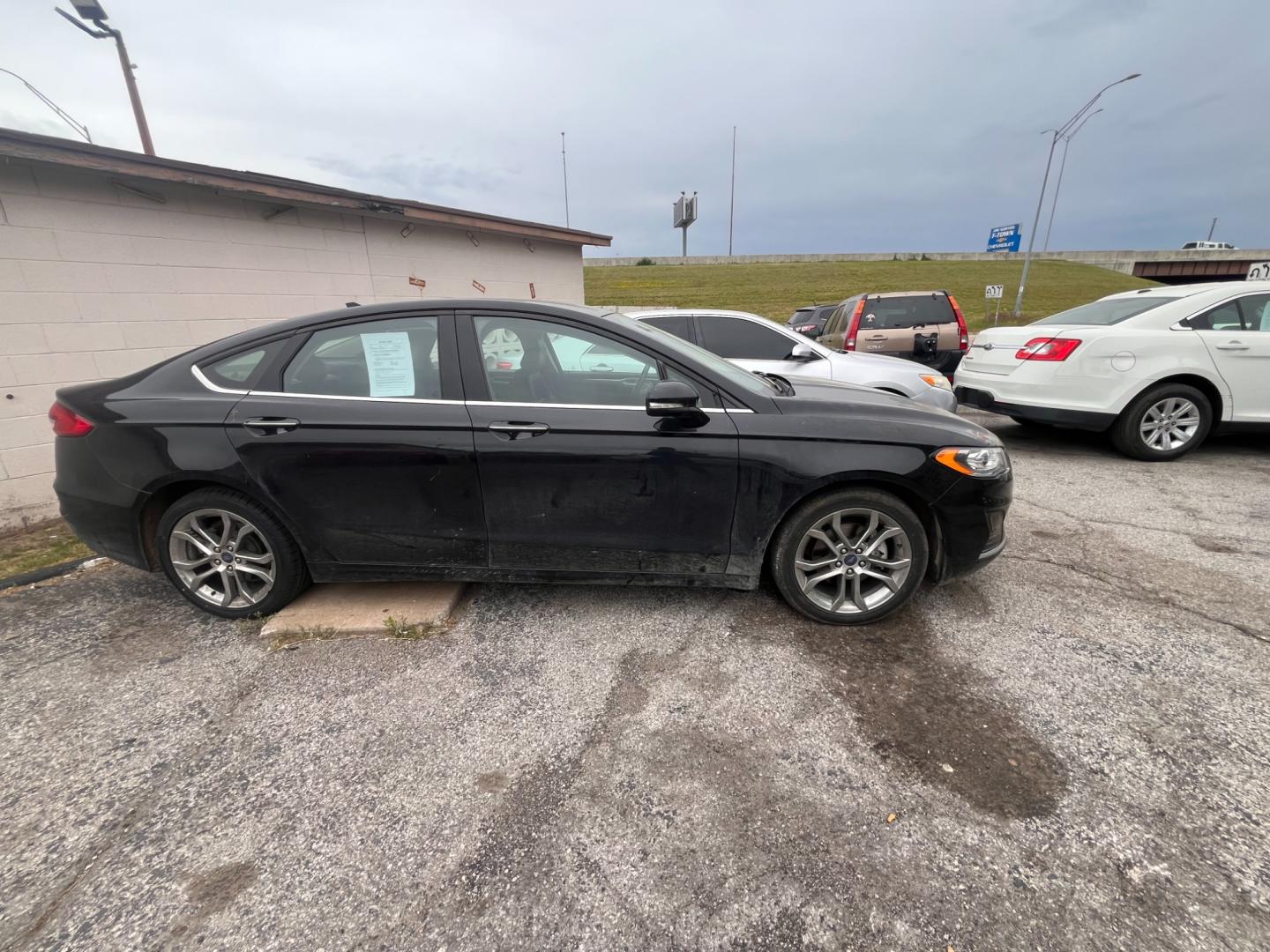 2020 BLACK FORD FUSION SEL SEL (3FA6P0CD5LR) with an 1.5L L4 DOHC 16V engine, 6A transmission, located at 8101 E. Skelly Dr., Tulsa, OK, 74129, (918) 592-3593, 36.121891, -95.888802 - Photo#1